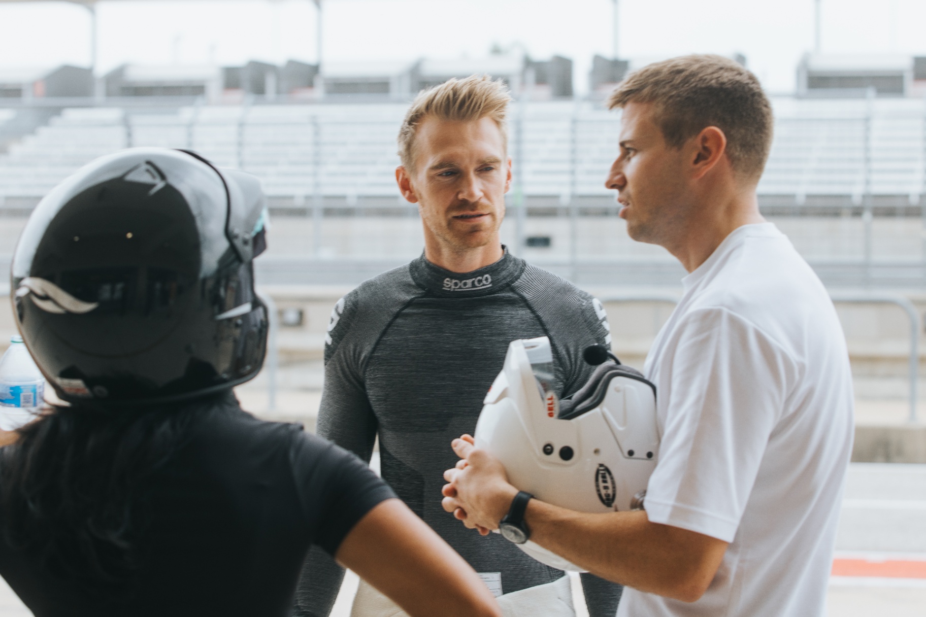 Drivers preparing on the pit lane